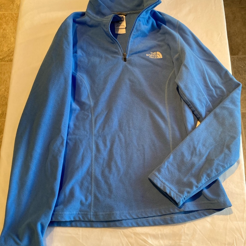 The North Face blue zipper sweatshirt